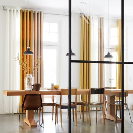 Gelbe Gardinen nach Maß im Esszimmer